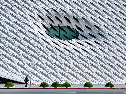 united states man standing near road side roof